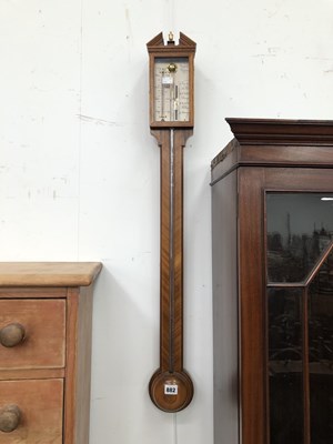 Lot 882 - A mahogany stick barometer