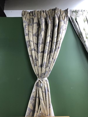 Lot 10 - Four drops of mauve ground curtains woven with...
