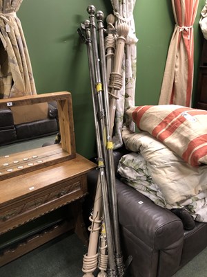 Lot 11 - A set of three metal curtain poles and two of...