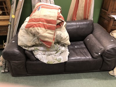 Lot 14 - A Brown leather two seat settee.  W 195 x D...