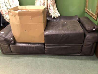 Lot 24 - A dark brown leather two seat settee.   W 240...