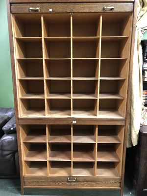 Lot 26 - An oak shop storage cabinet with pigeon hole...