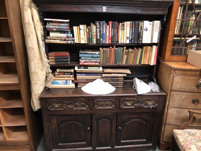 Lot 27 - A 19th century oak dresser, the enclosed shelf...