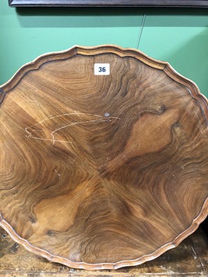 Lot 36 - A mahogany quarter veneered coffee table...