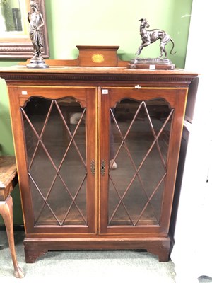 Lot 40 - A satin wood banded mahogany display cabinet...