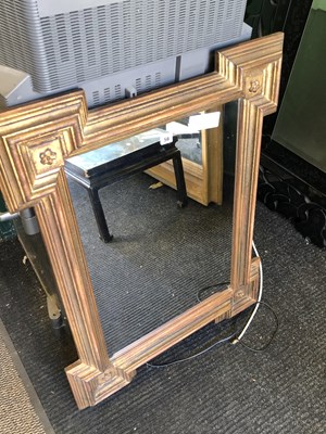 Lot 56 - A rectangular mirror in a gilt frame with...