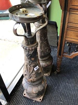 Lot 58 - A pair of baroque style metal table lamps