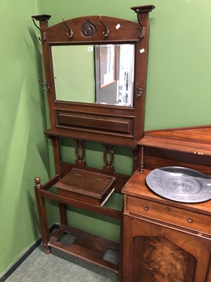 Lot 63 - An Art Nouveau mahogany mirror backed coat and...