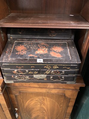 Lot 72 - A black lacquer writing slop gilt with...