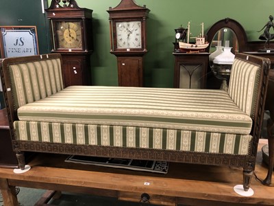 Lot 79 - A carved oak show frame chaise longue, the...