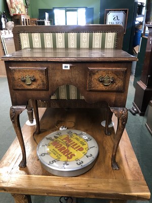Lot 80 - An 18th-century walnut two-drawer lowboy. The...