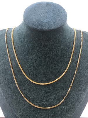Lot 514 - Two 9ct hallmarked gold pendant chains. Length...