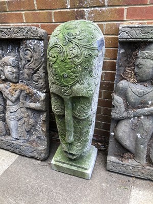 Lot 1337 - A large carved mask form sculpture
