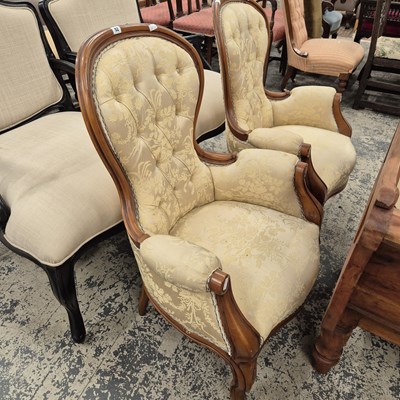 Lot 92 - A pair of button back armchairs.