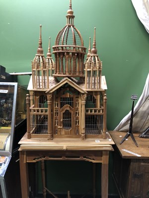 Lot 84 - A pine bird cage in cathedral style