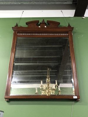 Lot 86c - A mahogany mirror with finnels and crown