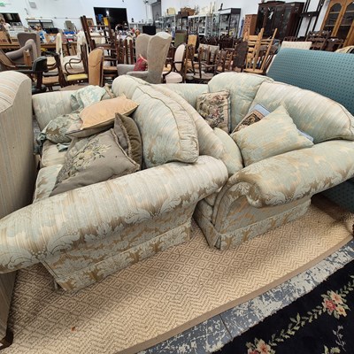 Lot 152 - A pair of vintage scroll arm lounge sofas.