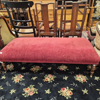 Lot 200 - A large stool on turned legs with brass...
