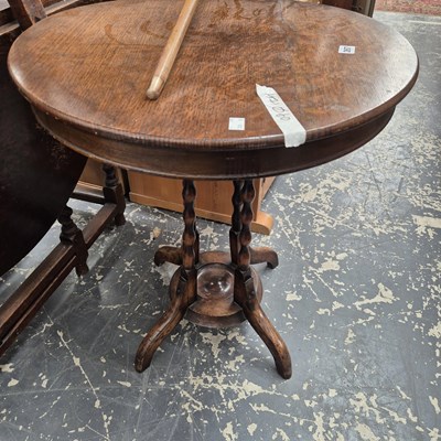 Lot 267 - An oak occasional table. 60 cm x 71 cm high