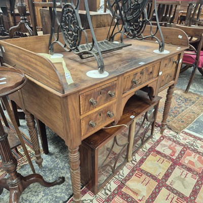 Lot 360 - A late Georgian mahogany gallery back washstand