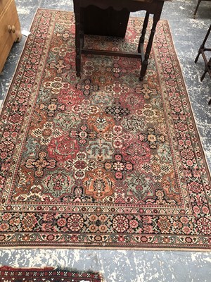 Lot 1654 - A machine made rug of Persian design, 226 x...