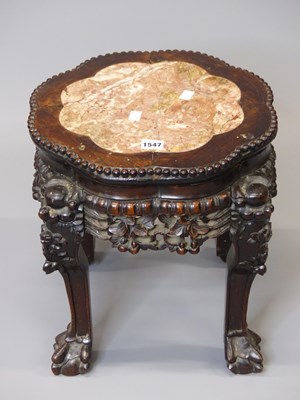 Lot 1547 - A Chinese marble topped hardwood stand, the...