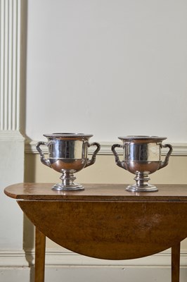 Lot 211 - A pair of regency twin handle wine coolers. ...