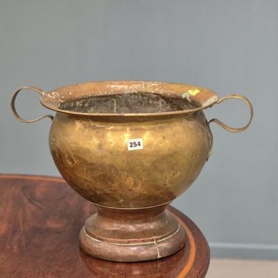 Lot 254 - A large early 19th centry brass and copper urn,...