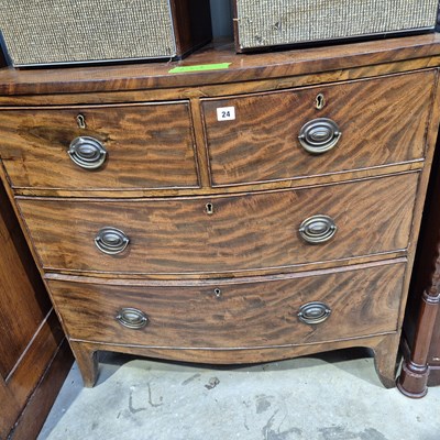Lot 24 - A 19th century mahogany small bow front chest...