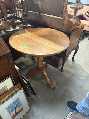 Lot 143 - A 19th century tripod table