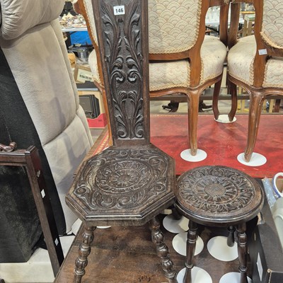 Lot 146 - A carved spinners chair and a similar carved...