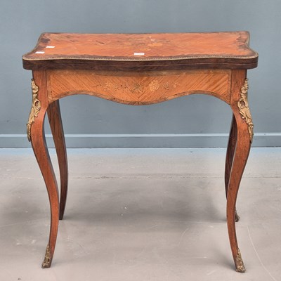 Lot 1709 - A French floral marquetry and rose wood cross...