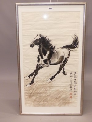 Lot 868 - Style of Xu Beihong, a framed scroll depicting...