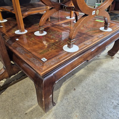 Lot 243 - A large oriental style coffee table. H 39 W...