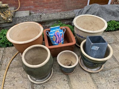 Lot 409 - Five glazed pottery garden planters, a square...