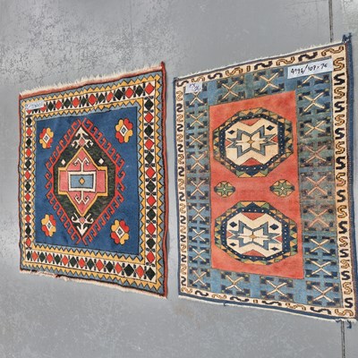 Lot 909 - Three Turkish tribal rugs, largest 225 x...