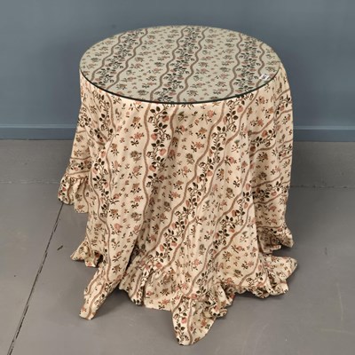Lot 647 - A single bedside table with draped fabric cover