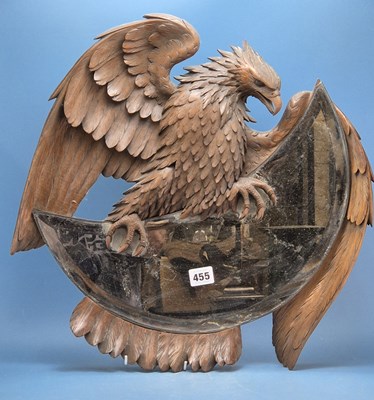 Lot 455 - An antique Continental carved spread wing...