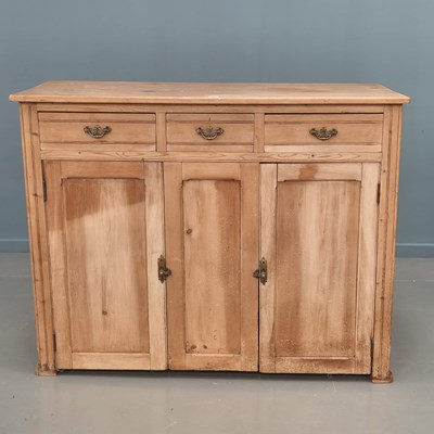 Lot 1357 - A 19th century pine side cabinet with two...