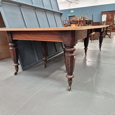 Lot 1358 - A 19th century mahogany eight legged extending...