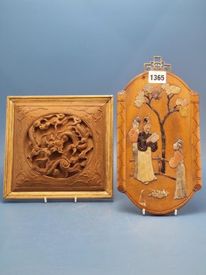 Lot 1365 - A Chinese wooden panel pierced and carved with...