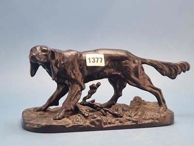 Lot 1377 - A Russian iron figure of a retriever standing...