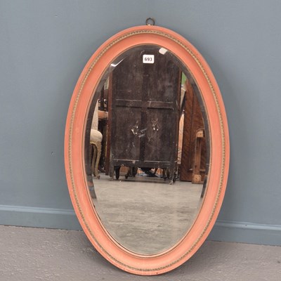 Lot 693 - An Edwardian oval wall mirror with a later...