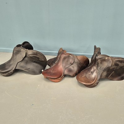 Lot 740 - Three vintage leather horse saddles, a leather...