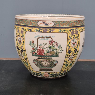 Lot 924 - A Chinese yellow ground planter, the exterior...