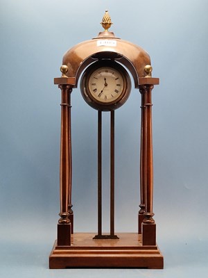 Lot 1405 - A mahogany portico-form cased gravity clock....