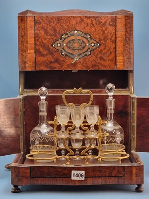 Lot 1406 - A Victorian burr walnut and inlaid tantalus...
