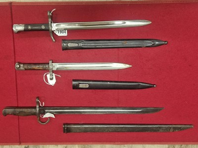 Lot 1904 - A Hungarian bayonet, a 1927 Finnish example...