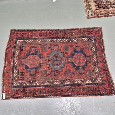Lot 593 - An antique Caucasian Kazak rug, L 230 W 160cms