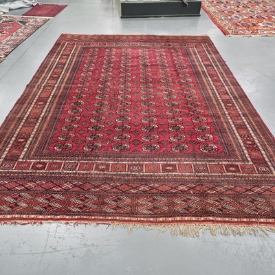 Lot 560 - An Oriental carpet of Tekke Bokhara design, L...